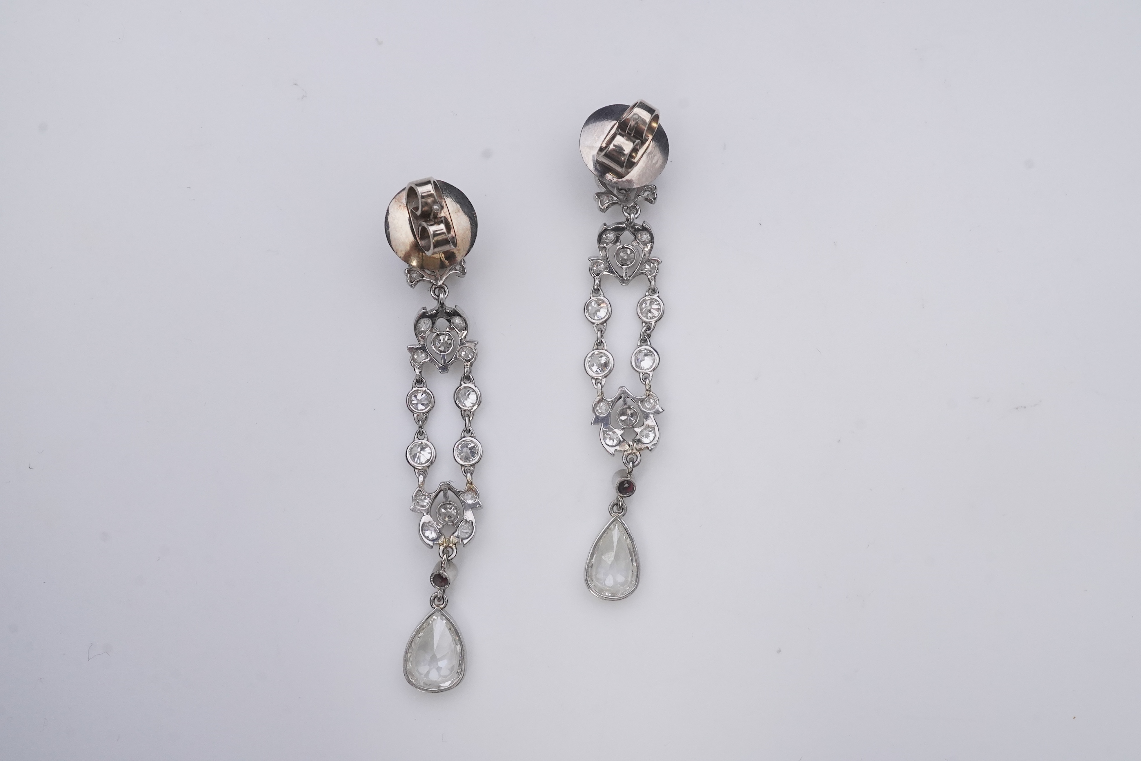 A pair of diamond earrings, early 20th century composite